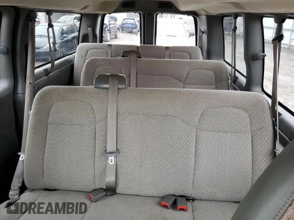 2013 Chevrolet Express Passenger 1LT с VIN 1GAZGYFG4D1190237, выставлен на аукционе Copart как лот 49204764 с пробегом 159 160 миль миль и Списание • Salvage title. История ставок и продаж доступна на DreamBid. Изображение 10.