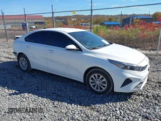 2023 Kia Forte LXS with VIN 3KPF24AD3PE643392, listed as a IAAI auction lot 40685879 with 62,445 mi miles. Bid and sale history available at carsss.com. Image 1.