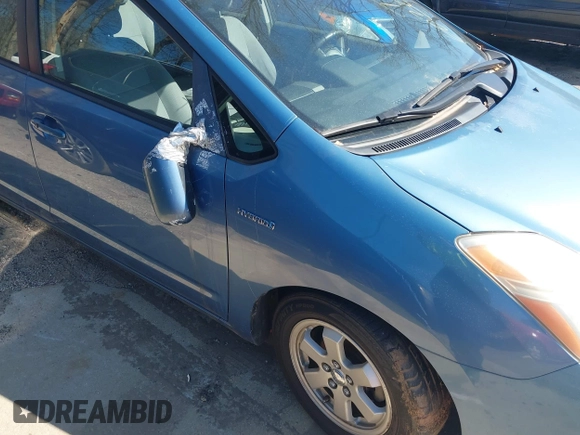 2007 Toyota Prius with VIN JTDKB20U177603087, listed as a IAAI auction lot 41828228 with 174,534 mi miles. Bid and sale history available at carsss.com. Image 6.