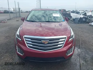 2018 Cadillac XT5 Premium Luxury FWD z VIN 1GYKNERS2JZ242842, wystawiony jako IAAI lot #42297159 z przebiegiem 72 008 mil mil oraz . Historia ofert i sprzedaży dostępna na DreamBid. Obrazek 12.