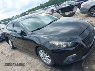 2016 Mazda 3 i Grand Touring with VIN JM1BM1X75G1283974, listed as a IAAI auction lot 42490887 with 141,360 mi miles and . Bid and sale history available at DreamBid. Image 1.