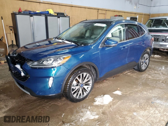 2020 Ford Escape Titanium Hybrid z VIN 1FMCU9DZ0LUA74302, wystawiony jako Copart lot #48614065 z przebiegiem 91 923 mil mil oraz Szkoda całkowita • Salvage title. Historia ofert i sprzedaży dostępna na DreamBid. Obrazek 1.
