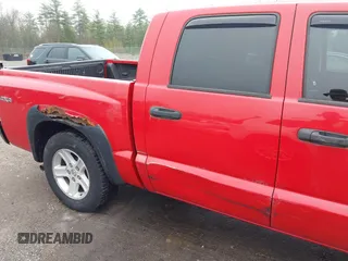 2011 Ram Dakota Bighorn/Lonestar with VIN 1D7RW3GK4BS549700, listed as a IAAI auction lot 42176692 with 167,832 mi miles. Bid and sale history available at carsss.com. Image 12.
