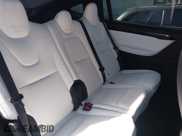 2020 Tesla Model X Long Range with VIN 5YJXCDE20LF265157, listed as a IAAI auction lot 41809572 with 58,599 mi miles. Bid and sale history available at carsss.com. Image 8.