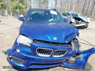2015 BMW X1 sDrive28i with VIN WBAVM1C58FV314947, listed as a IAAI auction lot 41874472 with 128,271 mi miles. Bid and sale history available at carsss.com. Image 12.