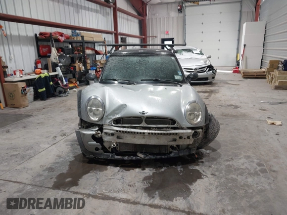 2002 MINI Hardtop with VIN WMWRC33422TC37296, listed as a IAAI auction lot 41385046 with 107,663 mi miles and . Bid and sale history available at DreamBid. Image 13.