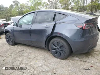 2024 Tesla Model Y Long Range z VIN 7SAYGDEE9RA293776, wystawiony jako Copart lot #51289225 z przebiegiem 12 990 mil mil oraz Szkoda całkowita • Salvage title. Historia ofert i sprzedaży dostępna na DreamBid. Obrazek 2.