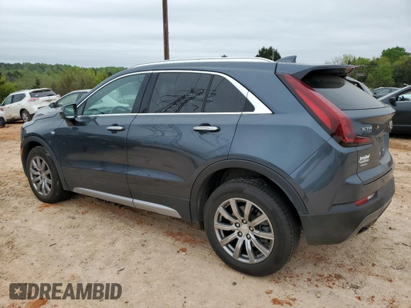 2021 Cadillac XT4 AWD Premium Luxury z VIN 1GYFZDR4XMF000937, wystawiony jako Copart lot #52406055 z przebiegiem 46 881 mil mil oraz Szkody całkowita. Historia ofert i sprzedaży dostępna na DreamBid. Obrazek 2.