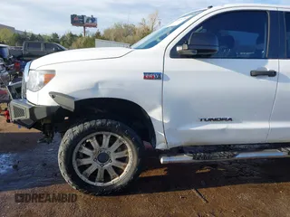 2012 Toyota Tundra 4WD Truck with VIN 5TFDW5F10CX241968, listed as a IAAI auction lot 41858300 with 272,634 mi miles. Bid and sale history available at carsss.com. Image 6.