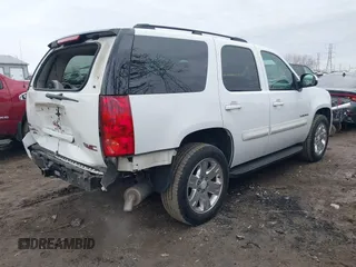 2007 GMC Yukon SLE with VIN 1GKFC13057R351385, listed as a IAAI auction lot 41720394 with 159,752 mi miles. Bid and sale history available at carsss.com. Image 4.