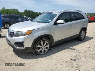 2013 Kia Sorento LX with VIN 5XYKT4A20DG323200, listed as a Copart auction lot 61738005 with 205,312 mi miles and Salvage title. Bid and sale history available at DreamBid. Image 1.