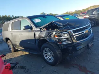 2019 Chevrolet Suburban LT with VIN 1GNSCHKC9KR327072, listed as a IAAI auction lot 40852032 with 109,815 mi miles and . Bid and sale history available at DreamBid. Image 13.