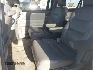 2005 Honda Odyssey EX-L with VIN 5FNRL38645B419566, listed as a IAAI auction lot 42104083 with 255,274 mi miles and . Bid and sale history available at carsss.com. Image 8.