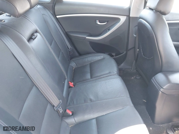 2013 Hyundai Elantra GT with VIN KMHD35LE9DU058163, listed as a IAAI auction lot 42067923 with 180,638 mi miles. Bid and sale history available at carsss.com. Image 8.