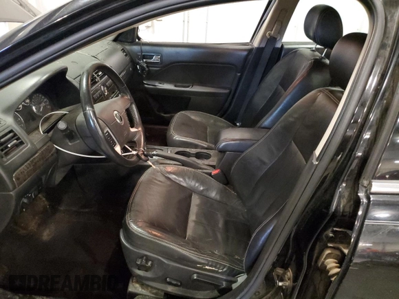 2008 Mercury Milan Premier z VIN 3MEHM08198R655613, wystawiony jako Copart lot #61052595 z przebiegiem 241 329 mil mil oraz Szkoda całkowita • Salvage title. Historia ofert i sprzedaży dostępna na DreamBid. Obrazek 7.