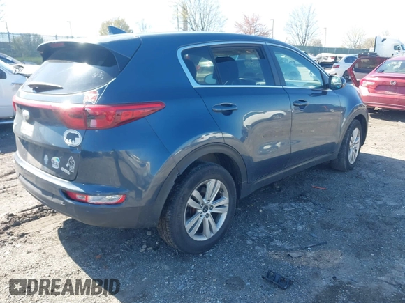 2018 Kia Sportage LX with VIN KNDPM3AC1J7424163, listed as a IAAI auction lot 41989534 with 87,220 mi miles and . Bid and sale history available at carsss.com. Image 4.