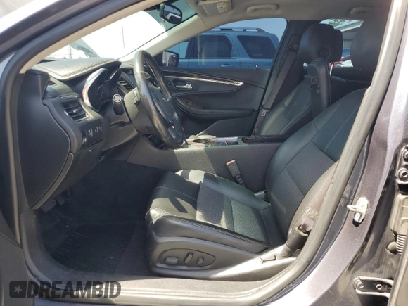 2014 Chevrolet Impala LT with VIN 2G1115SL2E9244163, listed as a Copart auction lot 57328675 with 136,548 mi miles and Salvage title. Bid and sale history available at DreamBid. Image 7.