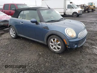 2009 MINI Convertible with VIN WMWMR33519TU96578, listed as a IAAI auction lot 41439278 with 100,070 mi miles and . Bid and sale history available at DreamBid. Image 1.
