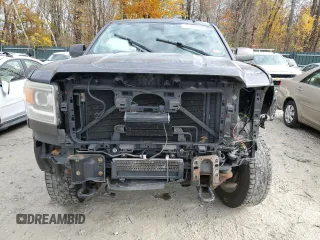 2015 GMC Sierra 2500HD SLT with VIN 1GT12ZEG1FF180216, listed as a Copart auction lot 77076384 with 67,751 mi miles and Salvage title. Bid and sale history available at DreamBid. Image 5.