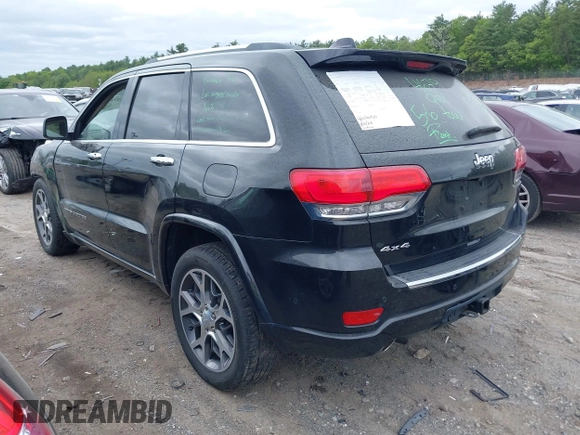 2019 Jeep Grand Cherokee High Altitude with VIN 1C4RJFCG2KC591143, listed as a IAAI auction lot 42274186 with 41,601 mi miles and . Bid and sale history available at DreamBid. Image 3.