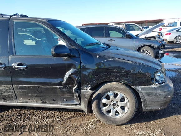 2004 Kia Sedona LX with VIN KNDUP131X46601278, listed as a IAAI auction lot 41472321 with 202,212 mi miles. Bid and sale history available at carsss.com. Image 6.