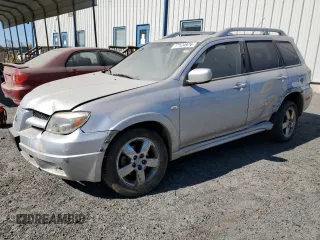 2006 Mitsubishi Outlander SE with VIN JA4LX41F66U025242, listed as a Copart auction lot 77124974 with 163,848 mi miles and Salvage Title. Bid and sale history available at carsss.com. Image 1.