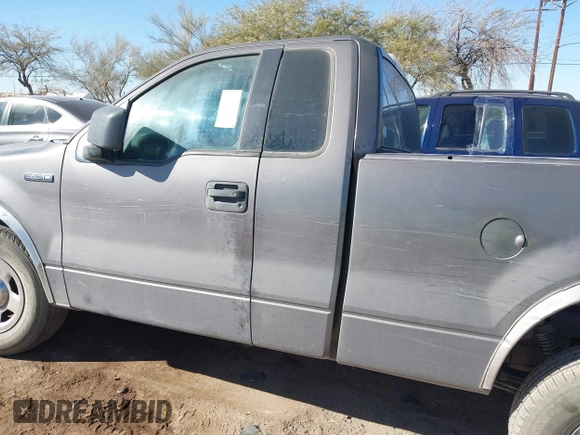 2005 Ford F-150 XL with VIN 1FTRF12275KC36456, listed as a IAAI auction lot 41341871 with 174,498 mi miles. Bid and sale history available at carsss.com. Image 13.