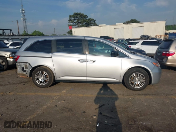 2013 Honda Odyssey EX-L with VIN 5FNRL5H6XDB084016, listed as a IAAI auction lot 42044300 with 156,296 mi miles and . Bid and sale history available at carsss.com. Image 13.