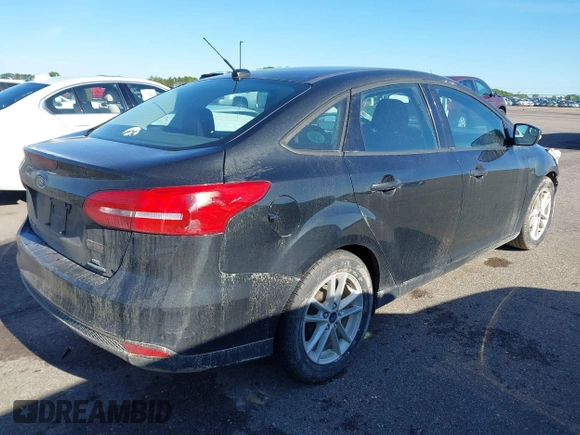 2015 Ford Focus SE with VIN 1FADP3F21FL385654, listed as a IAAI auction lot 42306171 with 187,725 mi miles and . Bid and sale history available at DreamBid. Image 4.