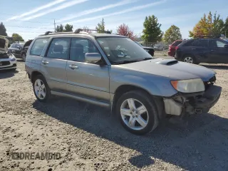 2007 Subaru Forester Sports XT with VIN JF1SG69677H709010, listed as a Copart auction lot 72143004 with 153,460 mi miles and Salvage Title. Bid and sale history available at carsss.com. Image 4.