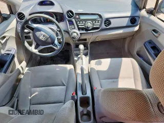 2010 Honda Insight LX with VIN JHMZE2H52AS043392, listed as a Copart auction lot 61347625 with 194,248 mi miles and Salvage title. Bid and sale history available at DreamBid. Image 8.