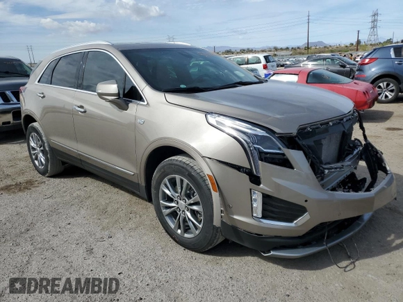 2022 Cadillac XT5 FWD Premium Luxury z VIN 1GYKNCRS9NZ180043, wystawiony jako Copart lot #51352195 z przebiegiem 12 399 mil mil oraz Szkoda całkowita • Salvage title. Historia ofert i sprzedaży dostępna na DreamBid. Obrazek 4.