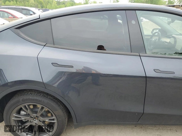 2024 Tesla Model Y Long Range с VIN 7SAYGDEE3RA328991, выставлен на аукционе Copart как лот 56637455 с пробегом Не указан миль и Списание • Salvage title. История ставок и продаж доступна на DreamBid. Изображение 11.