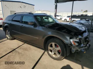 2008 Dodge Magnum z VIN 2D8GZ57208H100293, wystawiony jako Copart lot #69345394 z przebiegiem 191 085 mil mil oraz Szkoda całkowita • Salvage title. Historia ofert i sprzedaży dostępna na DreamBid. Obrazek 4.