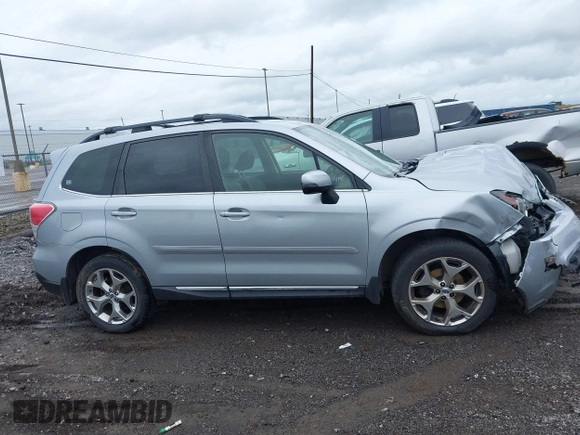 2018 Subaru Forester Touring with VIN JF2SJAWC6JH496875, listed as a IAAI auction lot 42347532 with 70,978 mi miles and . Bid and sale history available at DreamBid. Image 13.