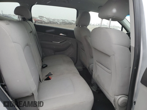 2012 Chevrolet Orlando 1LT z VIN KL77P2EM1CK550055, wystawiony jako Copart lot #77021754 z przebiegiem 127 987 mil mil oraz Szkoda całkowita • Salvage title. Historia ofert i sprzedaży dostępna na DreamBid. Obrazek 11.