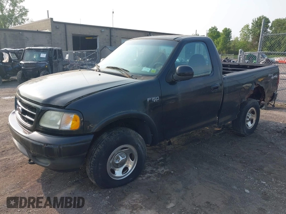 2003 Ford F-150 XL with VIN 2FTRF18243CB08751, listed as a IAAI auction lot 42456956 with 130,805 mi miles and . Bid and sale history available at DreamBid. Image 2.