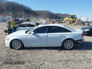 2015 Audi A6 Premium Plus z VIN WAUGFAFC4FN016103, wystawiony jako IAAI lot #41774479 z przebiegiem 125 412 mil mil oraz . Historia ofert i sprzedaży dostępna na DreamBid. Obrazek 15.
