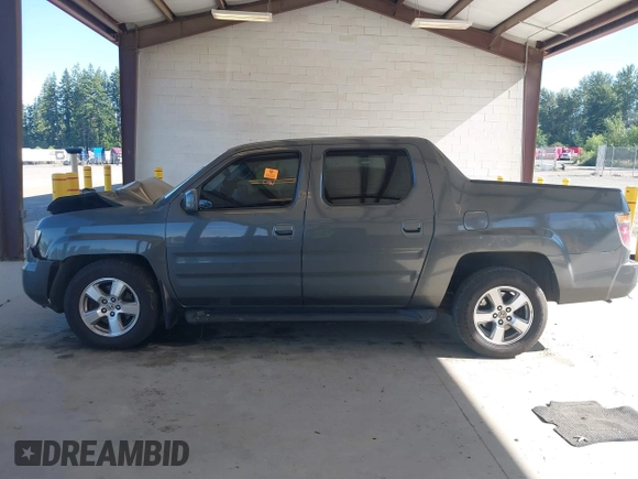 2007 Honda Ridgeline RTL with VIN 2HJYK16537H529904, listed as a IAAI auction lot 42626859 with 294,953 mi miles and . Bid and sale history available at DreamBid. Image 14.