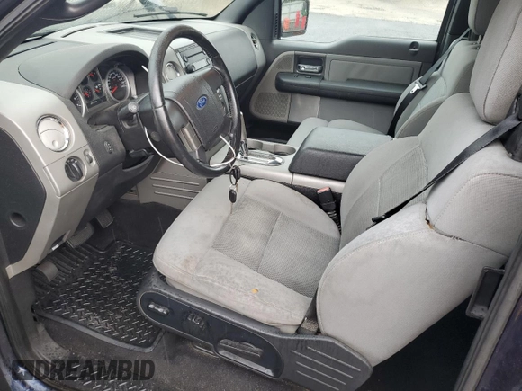 2004 Ford F-150 XLT with VIN 1FTPX14574NA86244, listed as a Copart auction lot 62428965 with 221,821 mi miles and Clean title. Bid and sale history available at DreamBid. Image 7.