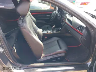 2015 BMW 4 Series 428i xDrive with VIN WBA3N5C55FK484938, listed as a IAAI auction lot 41889907 with 100,439 mi miles. Bid and sale history available at carsss.com. Image 5.