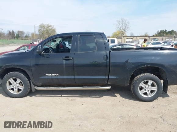 2010 Toyota Tundra 4WD Truck with VIN 5TFUM5F14AX015516, listed as a IAAI auction lot 42118639 with 204,489 mi miles. Bid and sale history available at carsss.com. Image 14.