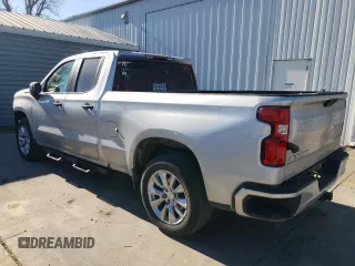 2021 Chevrolet Silverado 1500 Custom with VIN 1GCRWBEK0MZ188967, listed as a Copart auction lot 87637995 with 104,744 mi miles and Salvage Title. Bid and sale history available at DreamBid. Image 2.