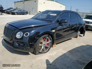 2017 Bentley Bentayga W12 with VIN SJAAC2ZV2HC012569, listed as a Copart auction lot 62984934 with 60,411 mi miles and Salvage Title. Bid and sale history available at carsss.com. Image 1.