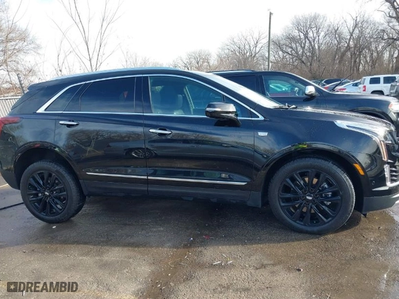 2021 Cadillac XT5 AWD Premium Luxury with VIN 1GYKNDRS0MZ135660, listed as a IAAI auction lot 41123089 with 26,361 mi miles. Bid and sale history available at carsss.com. Image 13.