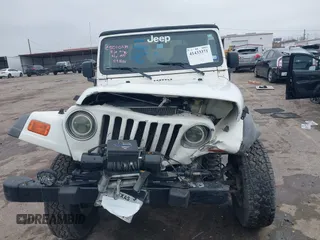 2005 Jeep Wrangler Sport with VIN 1J4FA49S25P320240, listed as a IAAI auction lot 41433371 with 144,552 mi miles. Bid and sale history available at carsss.com. Image 12.