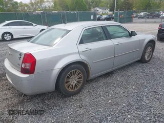 2008 Chrysler 300 Touring with VIN 2C3KA53G48H309834, listed as a IAAI auction lot 42200833 with 209,198 mi miles. Bid and sale history available at carsss.com. Image 4.