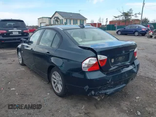 2006 BMW 3 Series 325xi with VIN WBAVD13516KT79513, listed as a IAAI auction lot 41609704 with 116,883 mi miles. Bid and sale history available at carsss.com. Image 3.