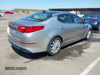 2014 Kia Optima EX with VIN 5XXGN4A75EG317958, listed as a IAAI auction lot 42075557 with 138,903 mi miles and . Bid and sale history available at carsss.com. Image 4.
