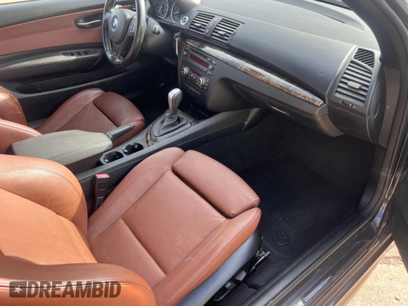 2010 BMW 1 Series 135i with VIN WBAUN9C51AVK41985, listed as a Copart auction lot 85383524 with 111,260 mi miles and Clean Title. Bid and sale history available at carsss.com. Image 5.